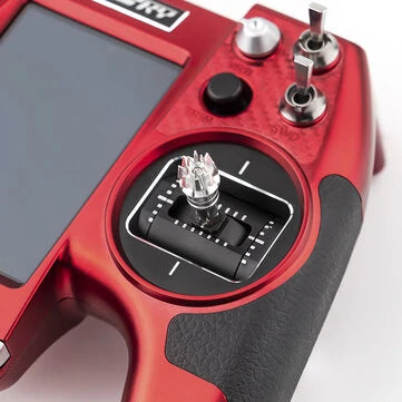 Close-up of Flysky Elysium EL18 remote controller showcasing CNC Hall gimbals and touch screen features.